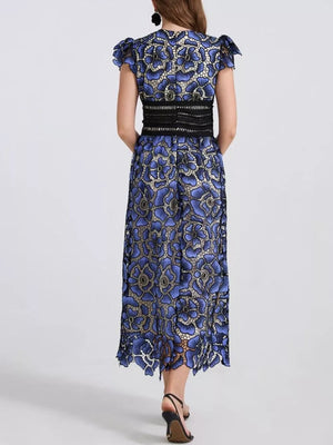 Blue floral lace midi dress with black waistband and flutter sleeves.
