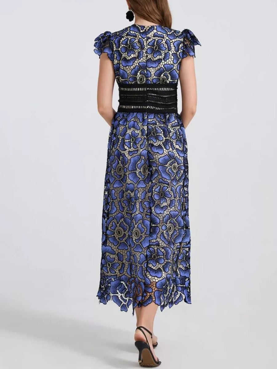 Blue floral lace midi dress with black waistband and flutter sleeves.