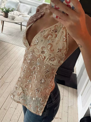 Embroidered halter neck cami top in gold with floral and paisley sequins.