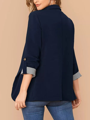 Navy blue blazer with roll-up sleeves featuring striped cuffs and a single button closure.