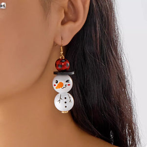 black earrings featuring dangle and plaid