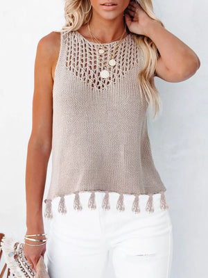 Knit tank top with crochet neckline and tassel hem in beige.
