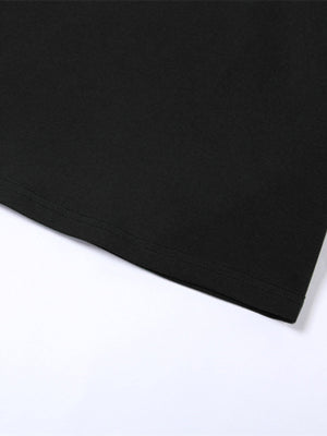Black cropped t-shirt with crew neck and double-stitched hem detail.