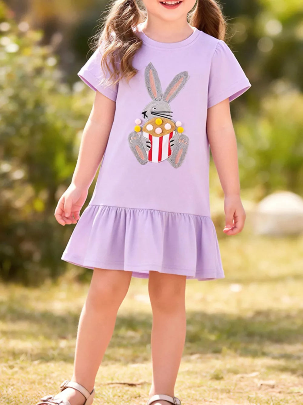 Lavender cotton dress with bunny appliqué and ruffled hem.