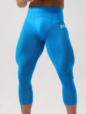 Sky blue compression capris with white GYM logo detail