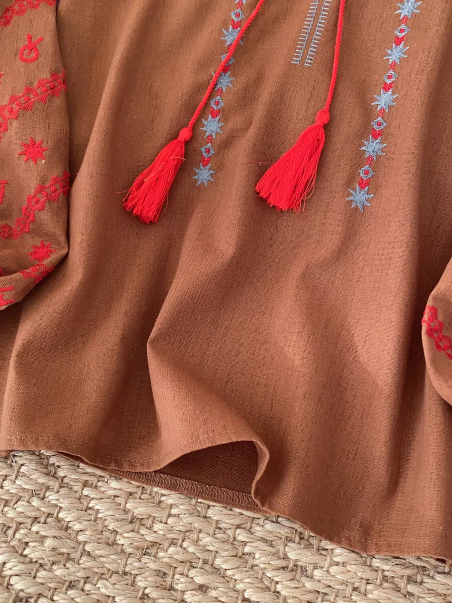 Embroidered folk-inspired tie neck shirt in Apricot