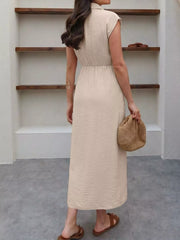 Elegant beige midi dress with tie-waist, collared neckline, and button-down front.