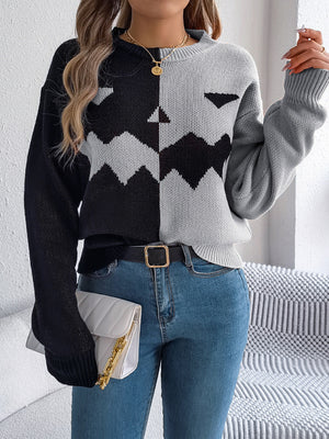 black pullover sweater with ribbed cuffs and long sleeve