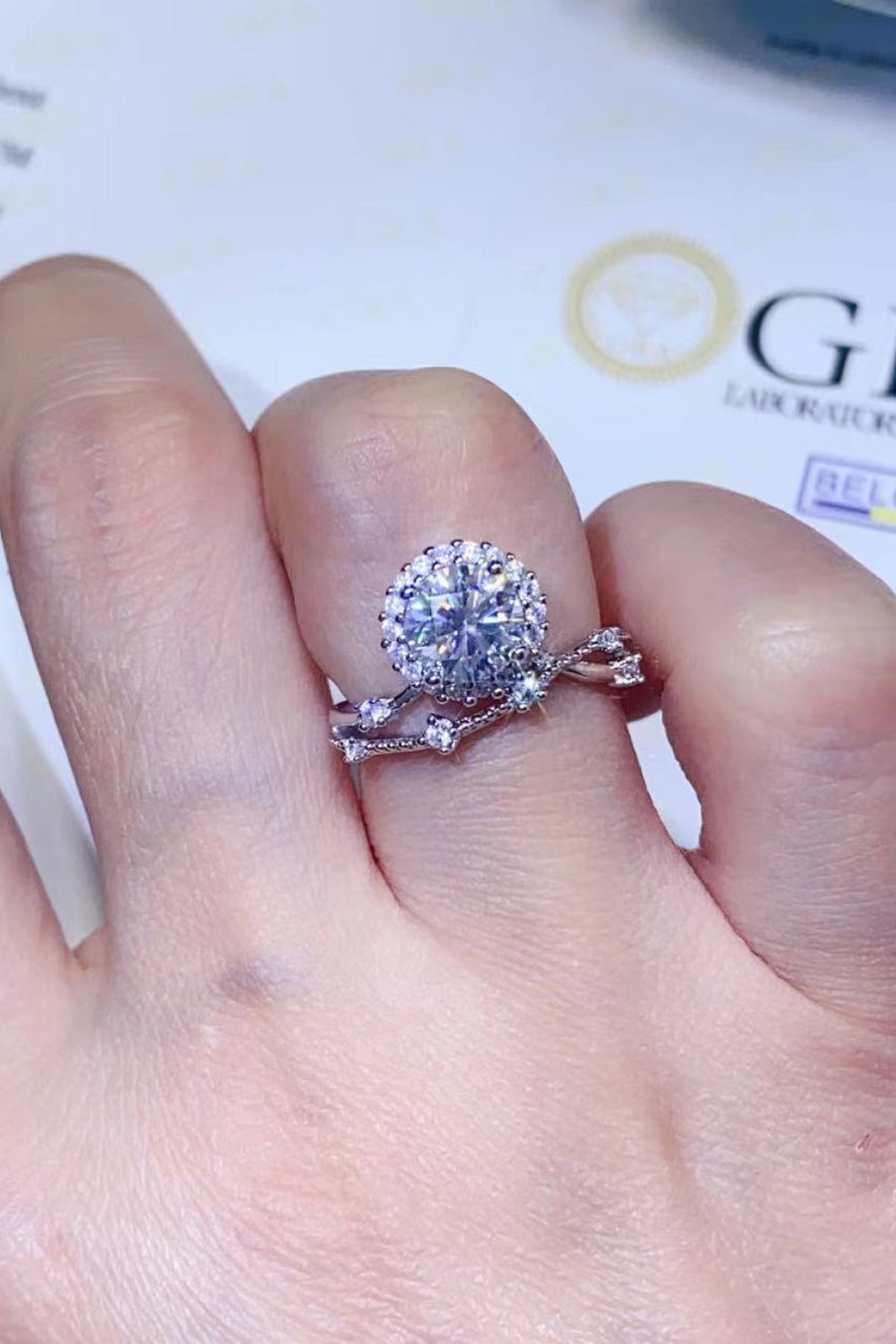 Celestial Halo Diamond Duo Ring in white with a round center stone and delicate band.