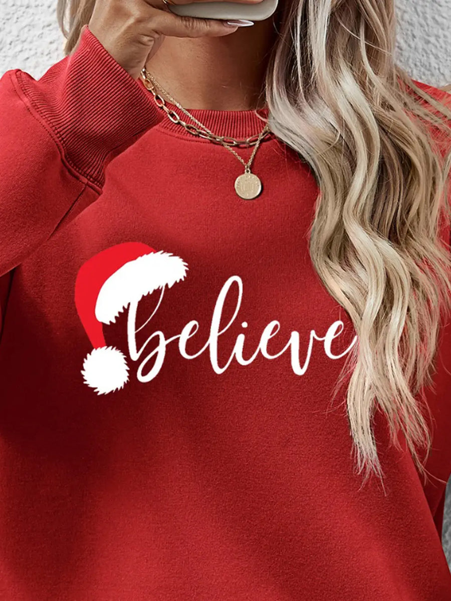 Deep Red raglan sweatshirt with white "Believe" graphic and Santa hat detail.