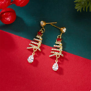earrings in clear with christmas tree motif and dangle style