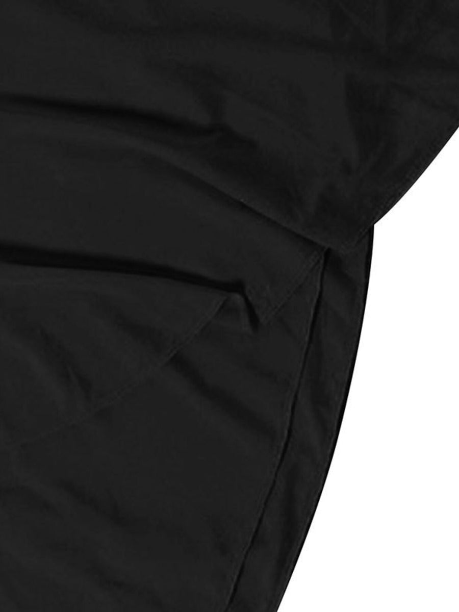 Black backless ruffled mini dress detail showing fabric and hem