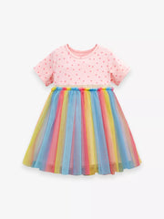 Toddler rainbow tulle dress with pink polka dot cotton top and short sleeves.