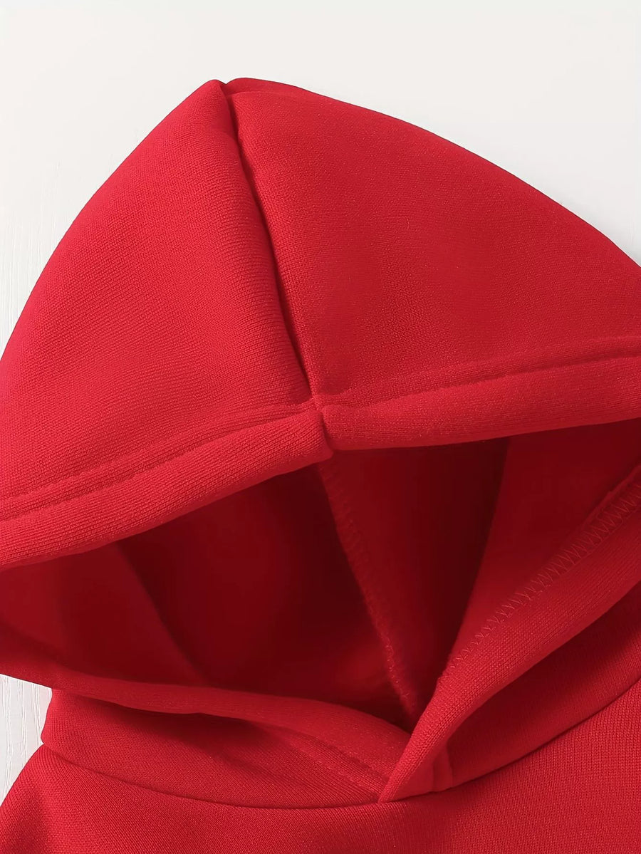 Red baby hoodie detail with stitched seams and lined hood.