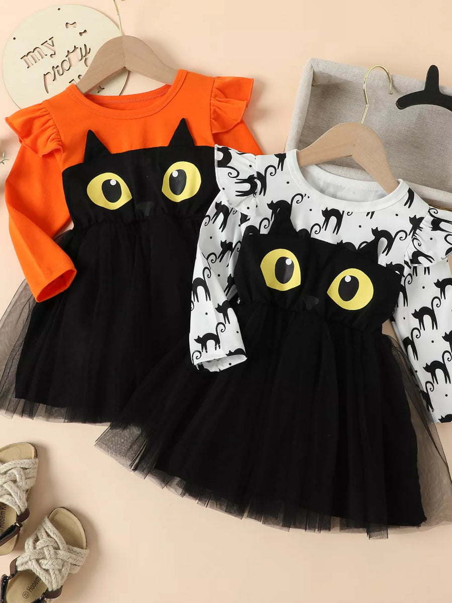 black dress with graphic and round neck