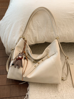 shoulder bag in ivory with gold-tone hardware and medium