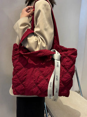 Burgundy diamond quilt nylon tote bag with logo strap detail
