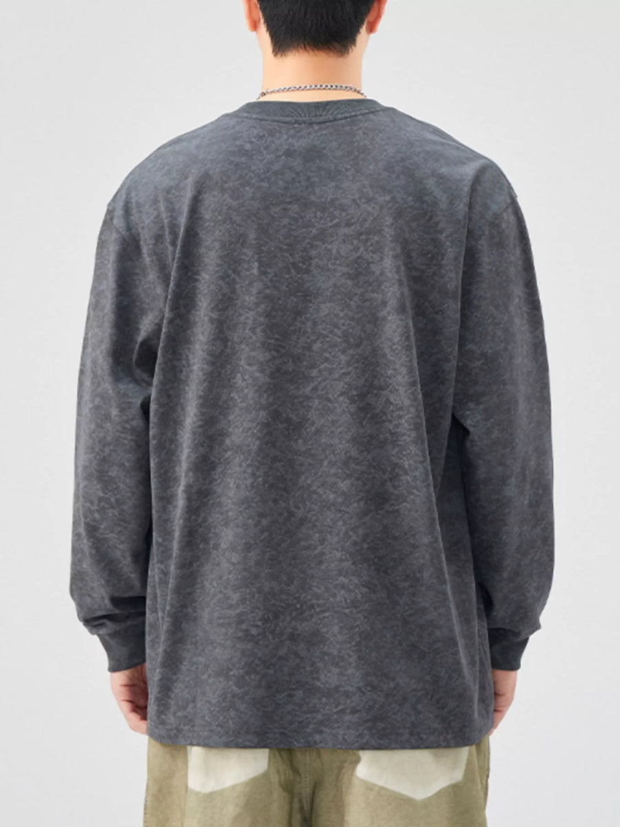 Oversized long-sleeve t-shirt in dark gray with a washed-out effect.
