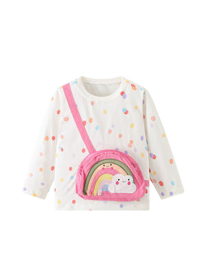 pink t-shirt featuring applique and polka dot