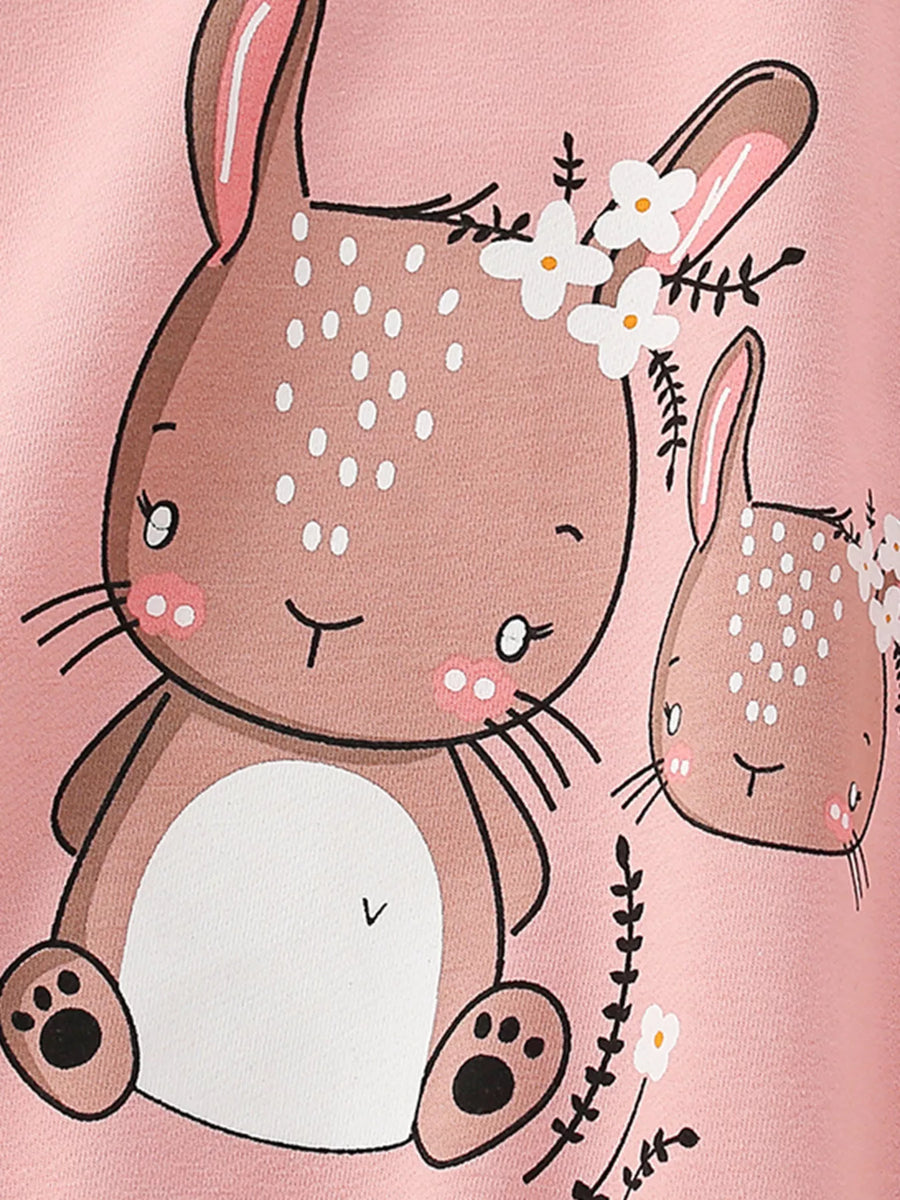 Pale blush cotton crew neck sweatshirt with cute bunny graphic and floral accents.