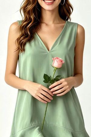 Sage tiered ruffle hem mini dress with V-neck and sleeveless design.