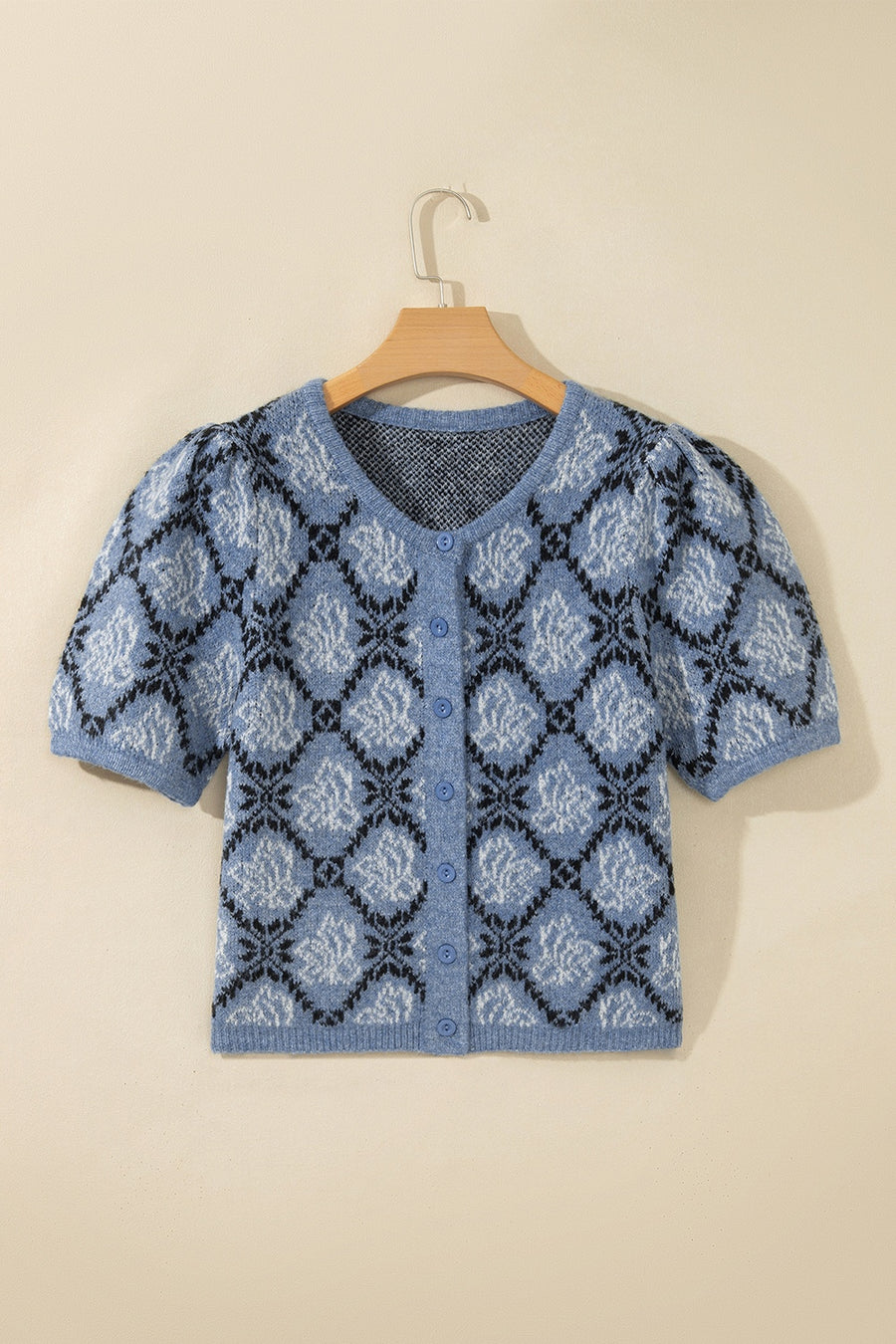 65% regenerated polyester 13% acrylic, 13% polyamide, 6% wool, 3% elastane Care cardigan in dusty blue with regular