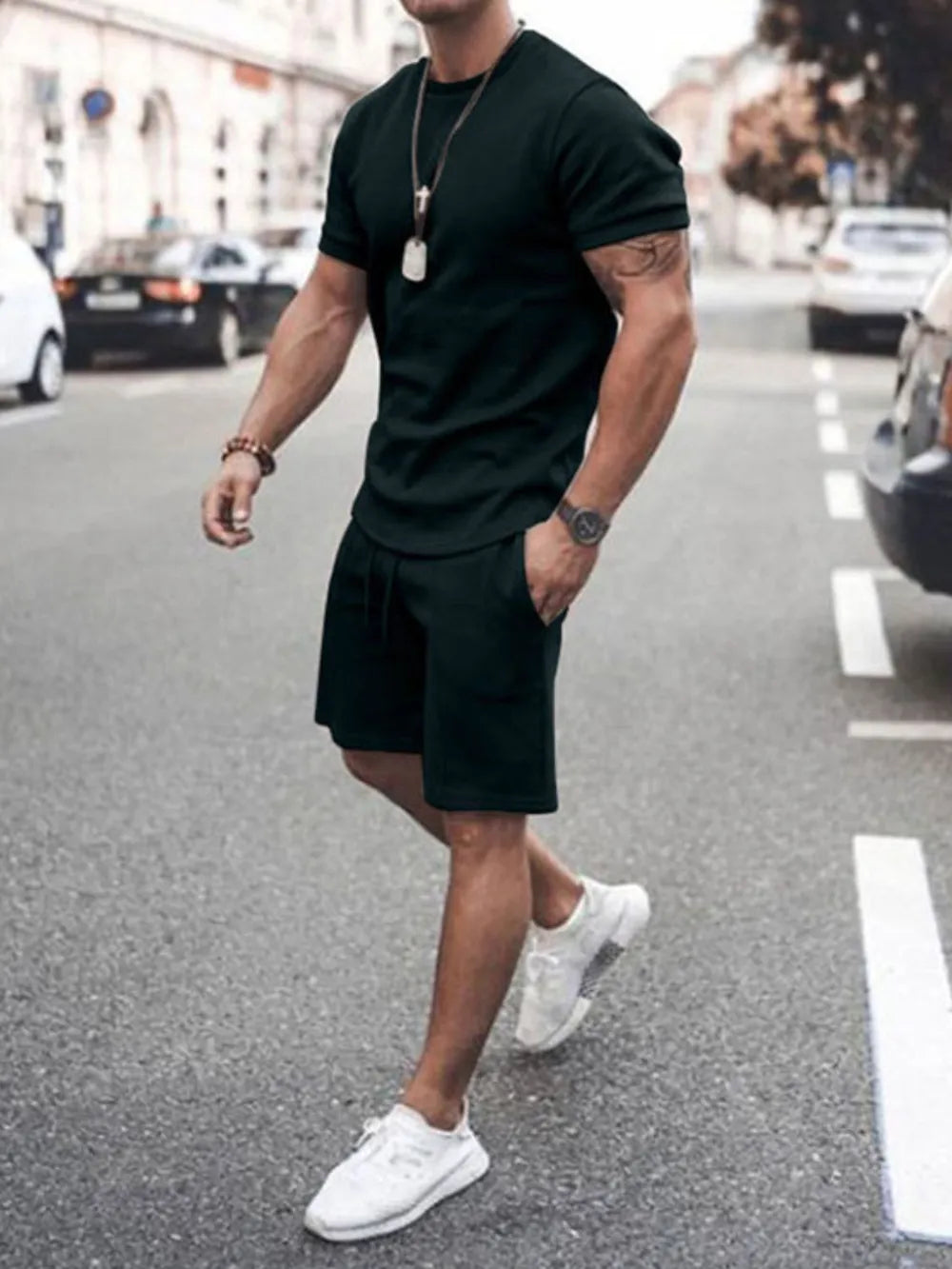 Men's black crew neck t-shirt and shorts co-ord set with drawstring waist.