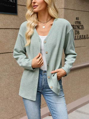 Green cardigan with hip-length and button-front
