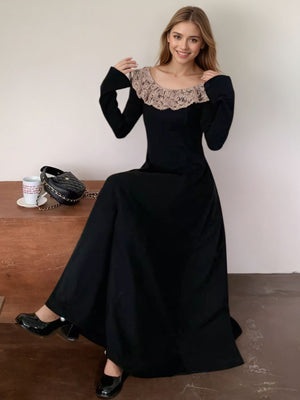 Black A-line dress with lace collar and bell cuffs, ankle length