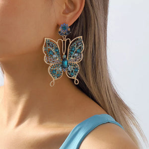 earrings featuring butterfly in teal with 18K Gold-Plated,Alloy,Rhinestone Care instructions: Avoid wearing during exercis