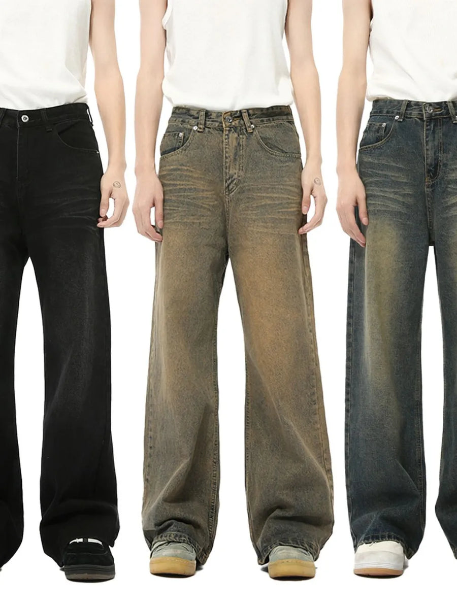 Whiskered denim straight leg jeans in black, taupe, and French blue.