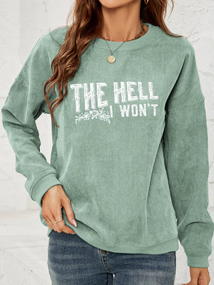 Textured corduroy crewneck sweatshirt in Gum Leaf with white graphic text and floral detail.
