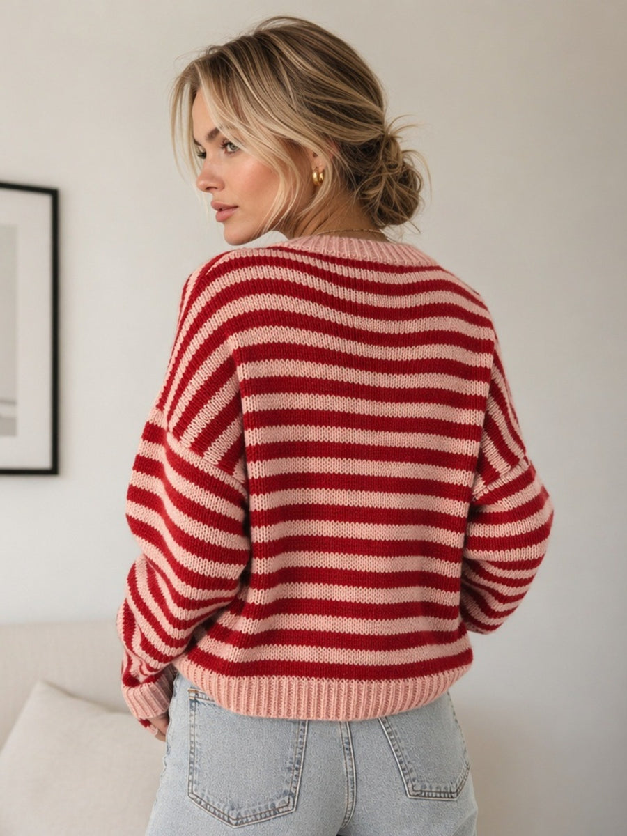 Pink crewneck sweater with hip-length and pullover