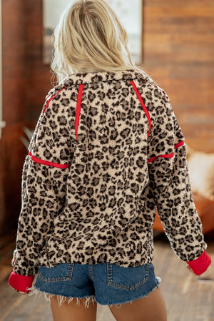 Shell: 100% polyester Lining:100% polyester Care instructions: Machine wash cold sweatshirt in red with relaxed silhouette
