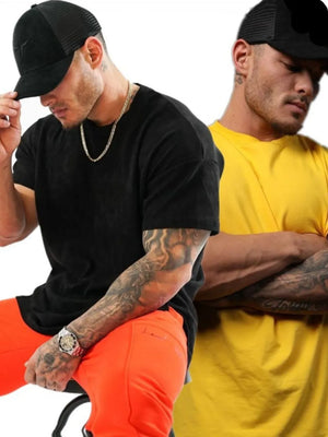 Oversized textured crew neck tee in black and yellow, with a relaxed fit and short sleeves.