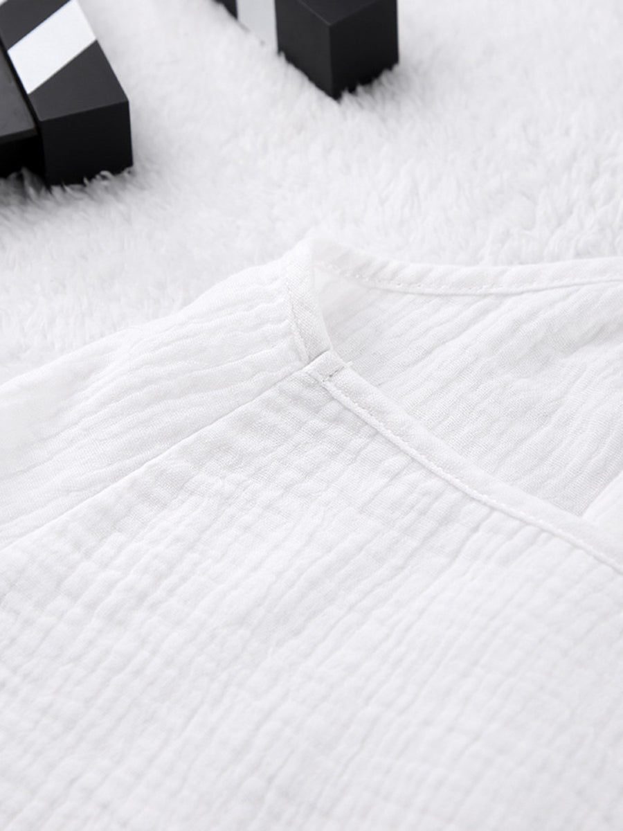White cotton cami pajama top with textured fabric and V-neck detail