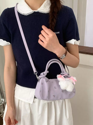 Purple crossbody bag with zip and ditsy floral