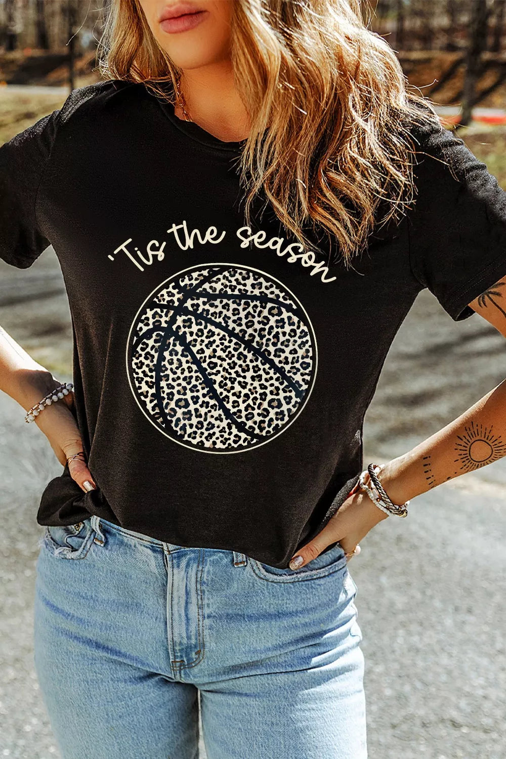 Black t-shirt with leopard print basketball graphic and 'Tis the season text