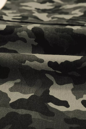 Women's camo print cotton jeans with a textured weave detail.