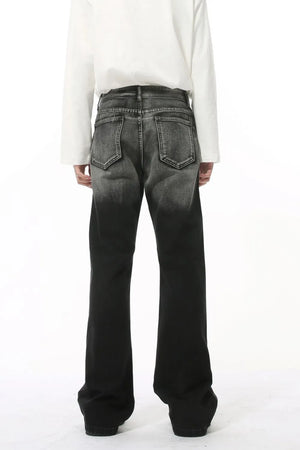 Faded flare jeans in dark denim with pleat detail and a gradient wash.