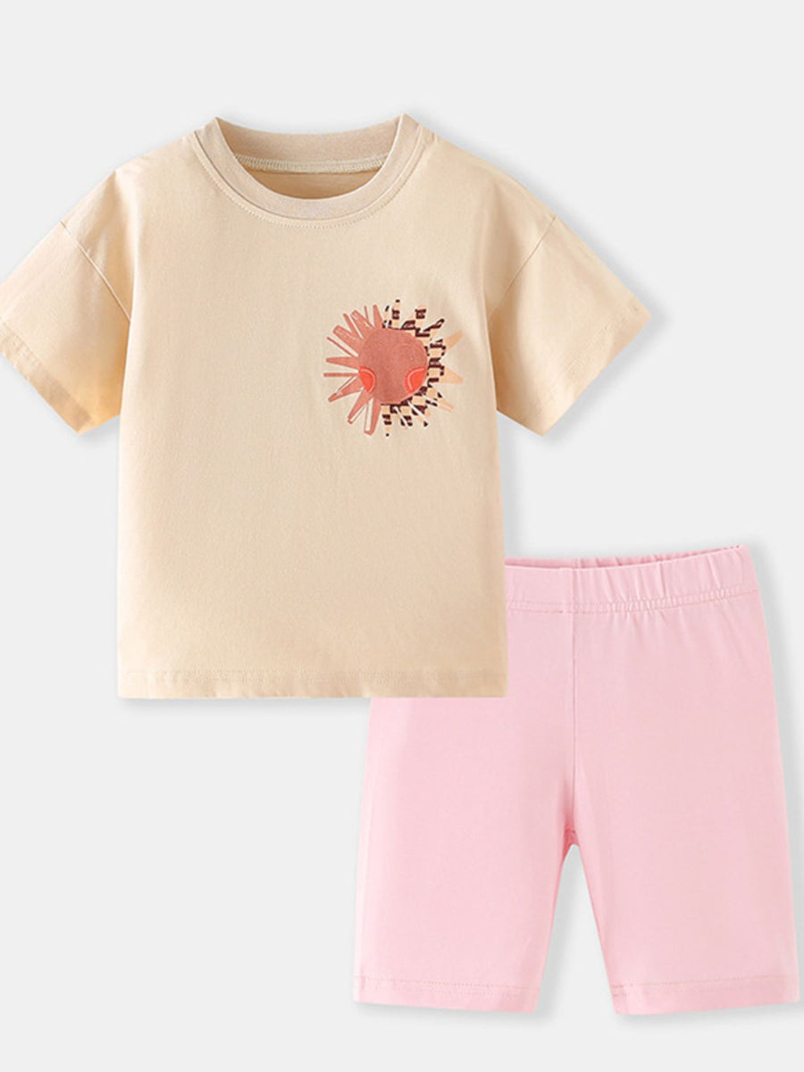 Toddler graphic tee with sun print and pink biker shorts set