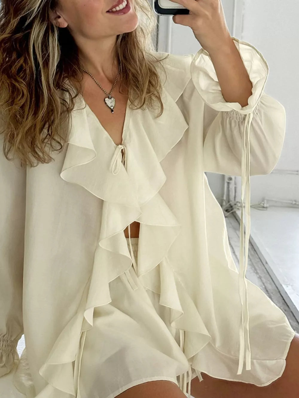 100% polyester Care instructions: Machine wash cold blouse in Beige with relaxed silhouette