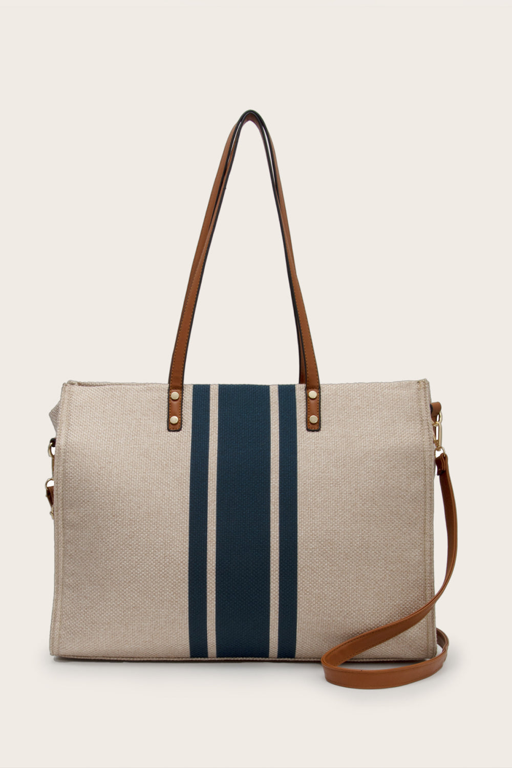 Nautical canvas tote bag in khaki with navy stripes and leather trim.