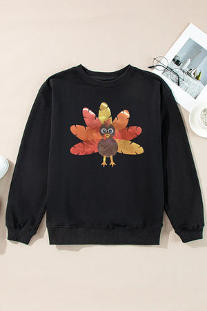 Black crewneck sweatshirt with a cartoon turkey graphic on the front.