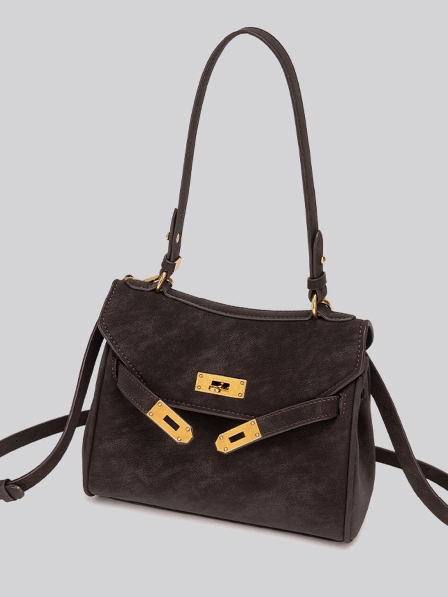 crossbody bag in Brown with gold-tone hardware and medium
