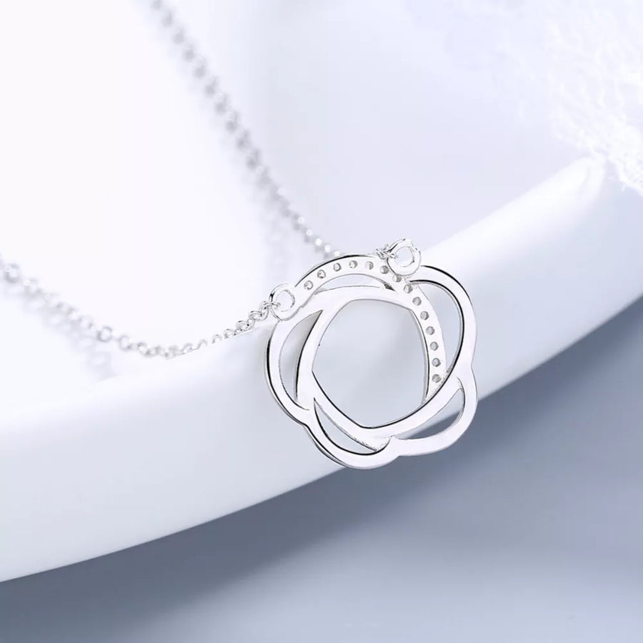 925 sterling silver,Zircon Care instructions: Avoid wearing during exercise, as necklace in clear with interlocking circles