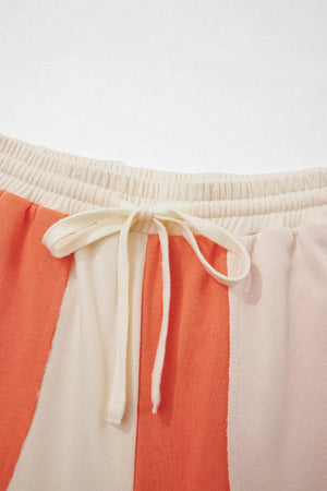 wide-leg pants featuring color-block in rust with 80% polyester, 20% cotton Care instructions: Machine wash cold texture