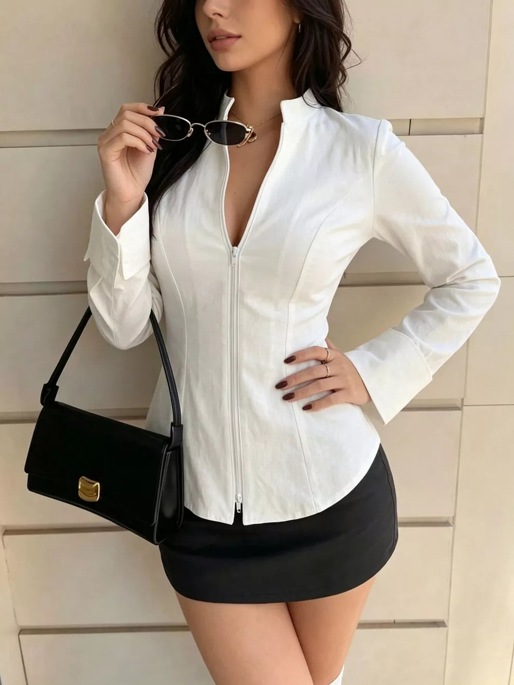 100% polyester Care instructions: Machine wash cold blouse in Ivory with fitted silhouette