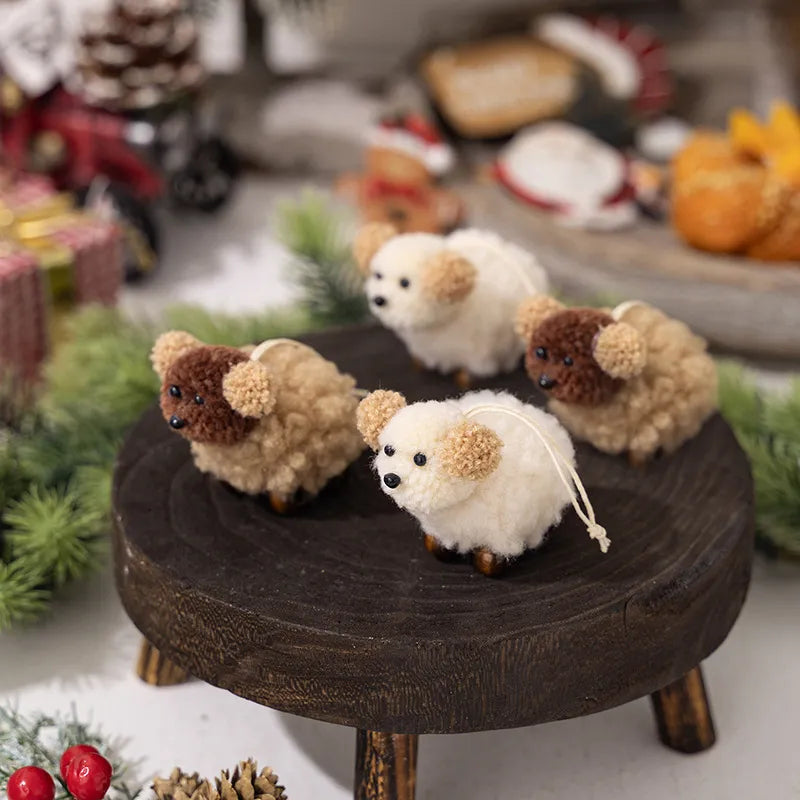 Woolly sheep ornaments with pom-pom ears in white and brown, cute holiday decor.