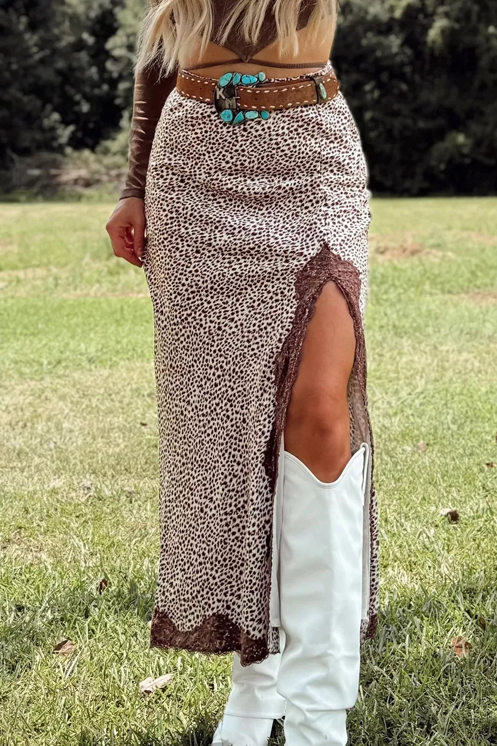 maxi skirt in cream featuring lace detail and straight fit